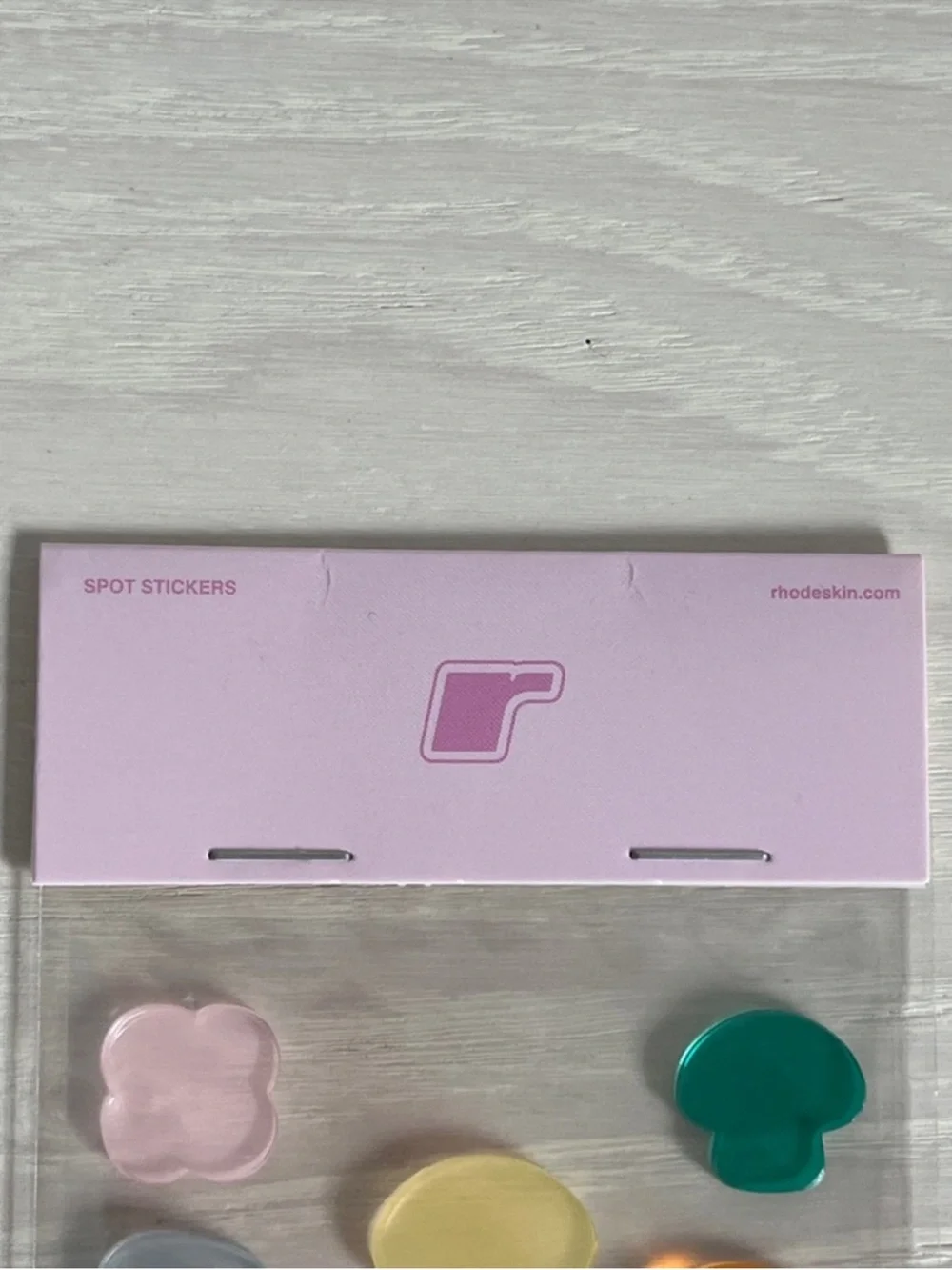 rhode skin translucent spot stickers in pink, teal, yellow, orange, blue